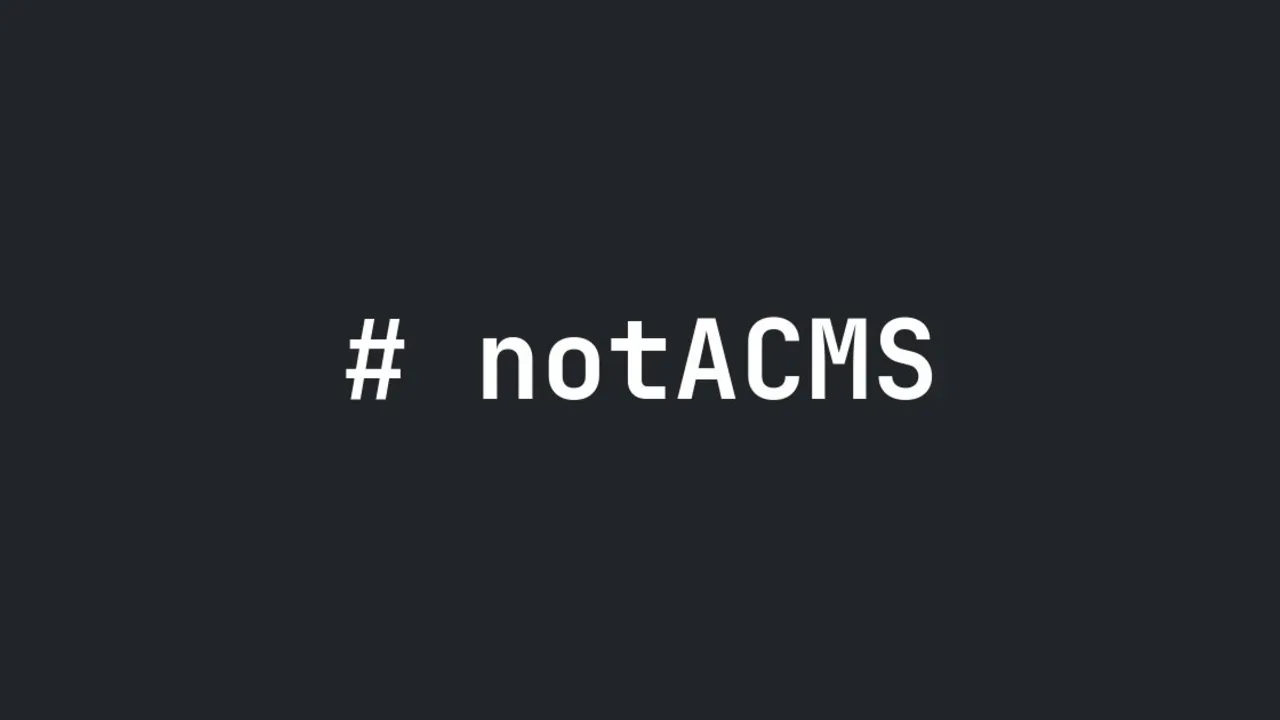 Tekst # notACMS na ciemnym granatowym tle.
